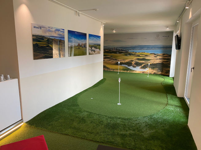Tucson indoor putting green in an office with scenic wall art